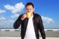 Young Asian Man Enjoy a Cup of Coffee Royalty Free Stock Photo