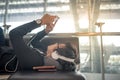 Young Asian man using smartphone in airport terminal Royalty Free Stock Photo