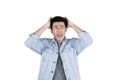 Young Asian man having headache on studio Royalty Free Stock Photo