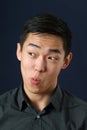 Young Asian man making face Royalty Free Stock Photo