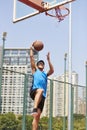 Young asian man playing basketball Royalty Free Stock Photo