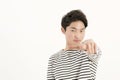 Young asian man pointing at you Royalty Free Stock Photo