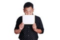 Young Asian Man Showing Small Whiteboard Covering His Face Royalty Free Stock Photo