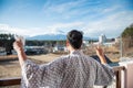 Young asian man stand looking Mount Fuji