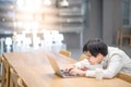 Young Asian man university student doing homework Royalty Free Stock Photo