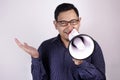 Young Businessman Smiling Shouting Using Megaphone, Marketing Promotion Concept
