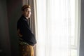 Young asian man wearing traditional clothes of indonesian beskap Royalty Free Stock Photo