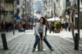 Young asian mixed-race woman is posing on the St. Catarina street, Porto
