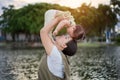 Young asian mother with a cute daughter is relaxing and happy in the park Royalty Free Stock Photo