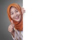 Young Muslim Woman Smiling Behind Blank White Board Royalty Free Stock Photo