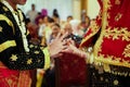 Young Asian muslim couple holding hand and putting wedding ring each other