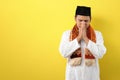 Young Asian Muslim man feel sad with covering his face with hands. Copy space concept Royalty Free Stock Photo