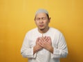 Young Asian muslim man suffer from chest pain. Heart attack or asthma concept Royalty Free Stock Photo