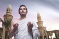 Young asian muslim man wearing ihram clothes Royalty Free Stock Photo