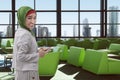 Young asian muslim woman on the airport Royalty Free Stock Photo