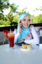 Young asian muslim woman in head scarf