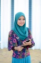 Young asian muslim woman in head scarf smile together Royalty Free Stock Photo