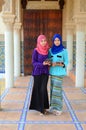 Young asian muslim woman in head scarf