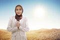 Young asian muslim woman in hijab with smiley face standing Royalty Free Stock Photo