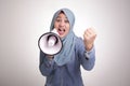 Asian muslim woman Shouting with Megaphone, Leader, Supporter or Protester Royalty Free Stock Photo