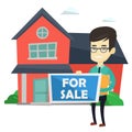 Young asian realtor offering house.