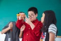 School children doing chemistry experiment