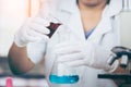 Young Asian Scientist are certain activities on experimental science like mixing chemicals or entry data to develop medicine, Royalty Free Stock Photo