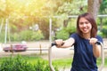 Young asian smile enjoy chest exercise in the park for healthy teen Royalty Free Stock Photo