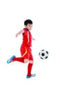 Young asian soccer player with soccer ball. Studio shot.