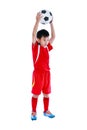 Young asian soccer player with soccer ball. Studio shot.