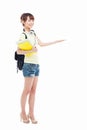 Young Asian student girl pointing side space Royalty Free Stock Photo