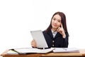 Young Asian student girl using tablet PC Royalty Free Stock Photo