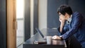 Young Asian student man with laptop computer Royalty Free Stock Photo