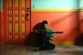 Young asian teen playing the guitar in a living room Royalty Free Stock Photo