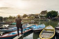 Young asian traveler with backpack at Hoi An ancient town