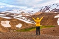 Young asian traveler woman enjoying in Kerlingarfjoll volcanic mountain on geothermal area in summer