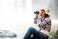 Young Asian traveler woman looking a binoculars. Royalty Free Stock Photo