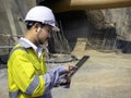 Young Asian tunnel engineering working at construction site Royalty Free Stock Photo