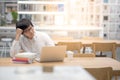 Young Asian university student working in library Royalty Free Stock Photo