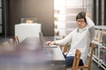 Young Asian university student working in library Royalty Free Stock Photo