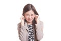 Young Asian woman block both ears with fingers.