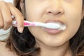 Young  asian woman brushing teeth in the morning,with healthy teeth concept Royalty Free Stock Photo