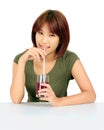 Young asian woman with a cglass of grape juice