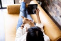 Young Asian woman and Chihuahua puppy together at home Royalty Free Stock Photo