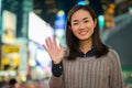 Young Asian woman in city at night Royalty Free Stock Photo