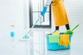 Young asian woman cleaning house Sweeping the floor with a mop House keeping concept Royalty Free Stock Photo