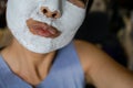 Asian Woman With Cleansing Mask On Her Face At Home. Skin Care. Royalty Free Stock Photo