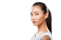Young asian woman closeup turned head and looking at camera Royalty Free Stock Photo