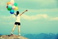 Young asian woman with colored balloons Royalty Free Stock Photo