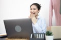 Young Asian woman congratulated and smiled as a large number of customers ordered her clothes online, Business of selling clothes